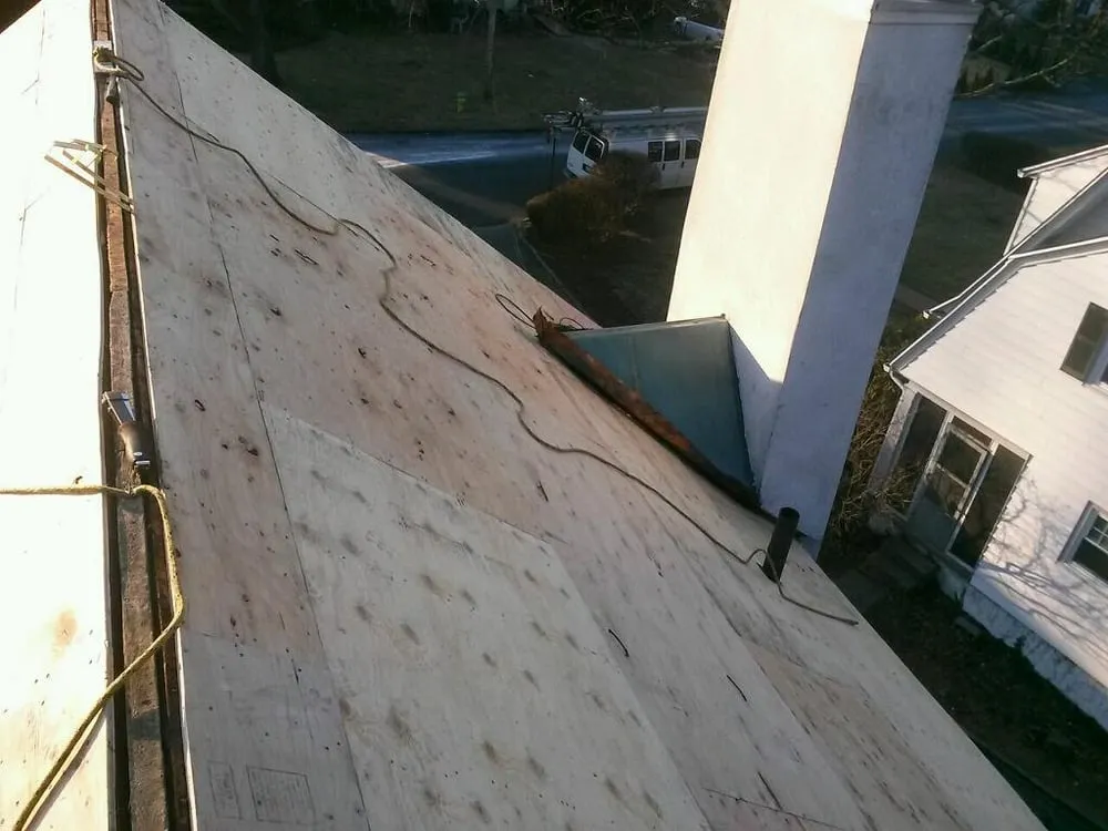 Slide of MNT Roofing & Siding