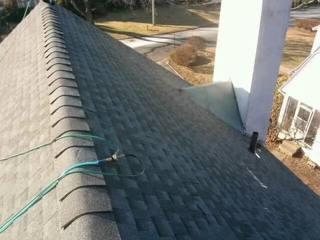 Slide of MNT Roofing & Siding