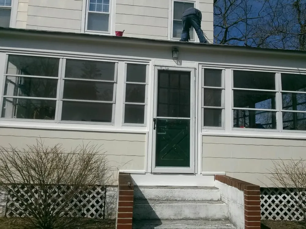 Slide of MNT Roofing & Siding