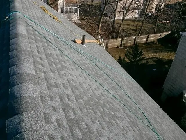 Slide of MNT Roofing & Siding