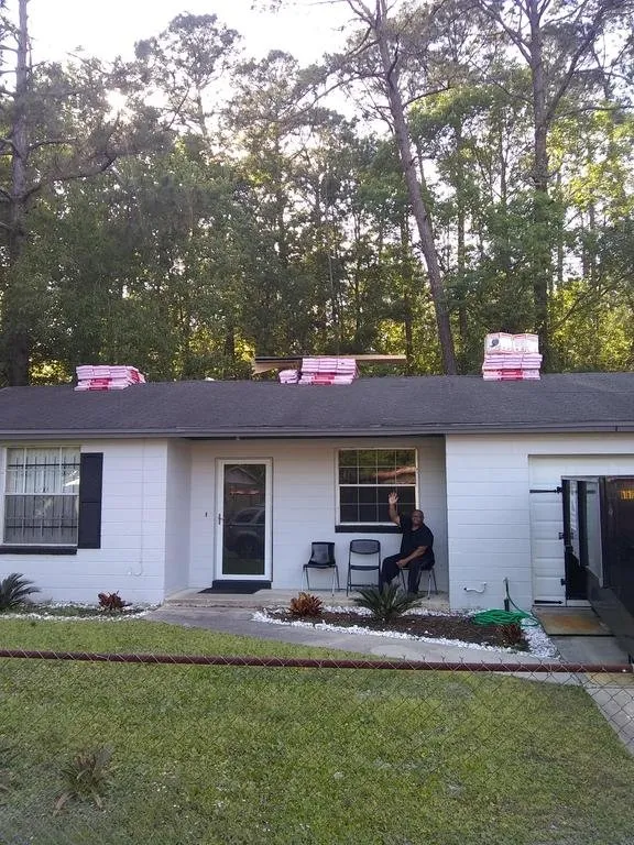 Slide of Model City Roofing