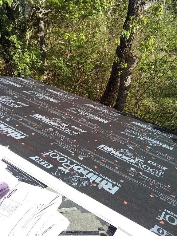 Slide of Model City Roofing