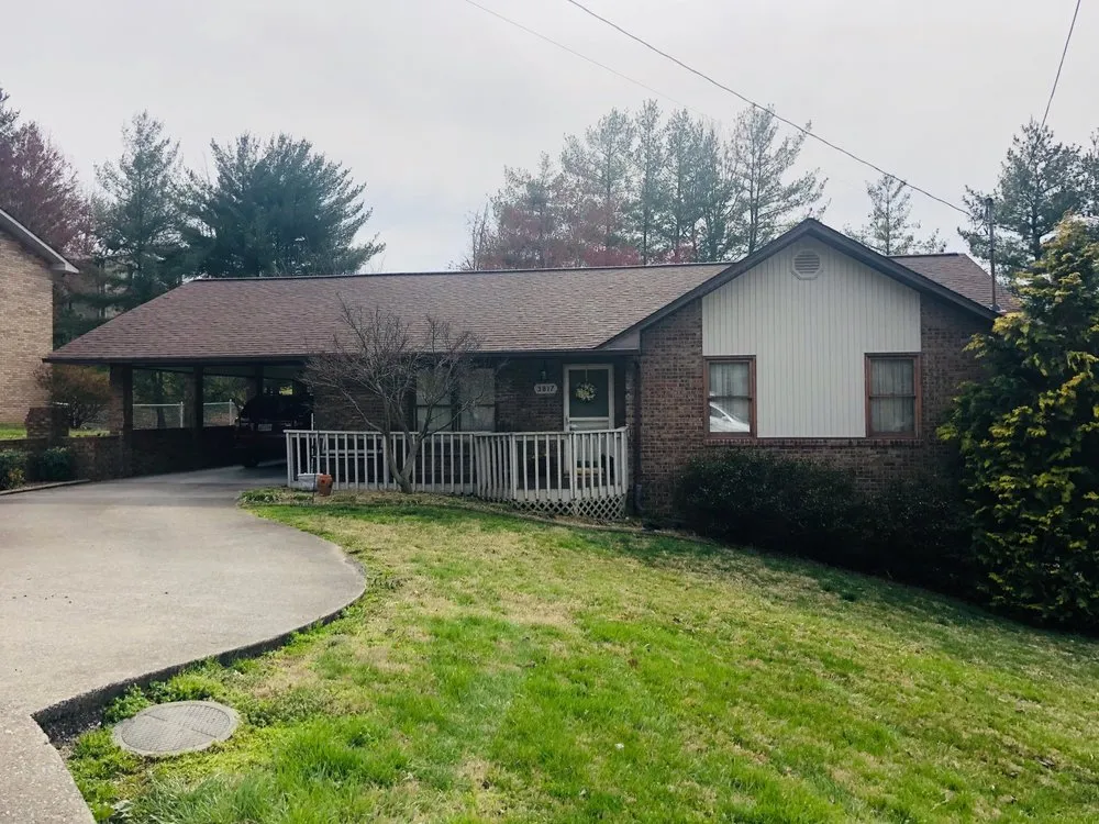 Slide of Model City Roofing