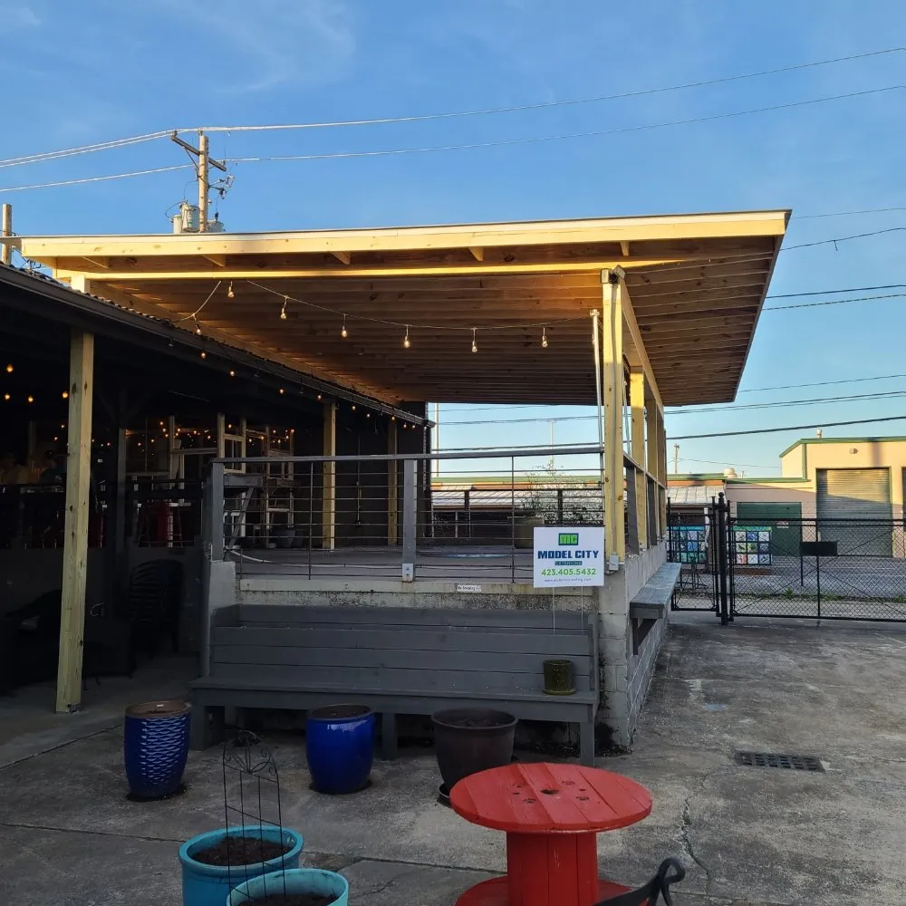 Slide of Model City Roofing