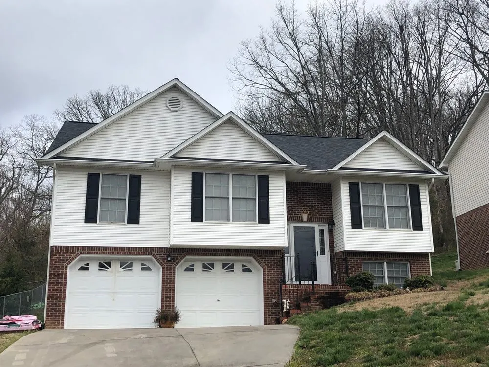 Slide of Model City Roofing