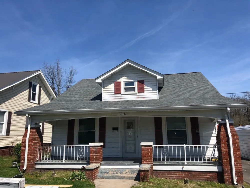 Slide of Model City Roofing