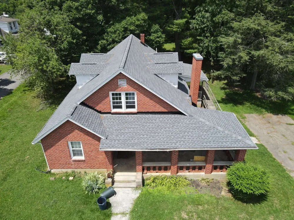 Slide of Modern Day Roofing