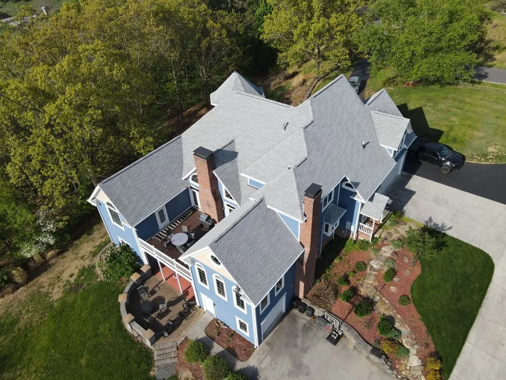 Slide of Modern Day Roofing