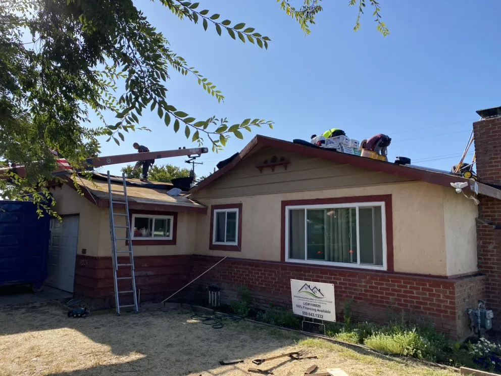 Slide of Modern Roofers and Restoration