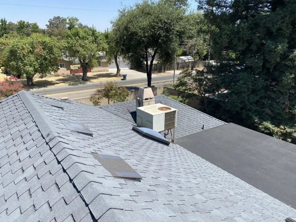 Slide of Modern Roofers and Restoration