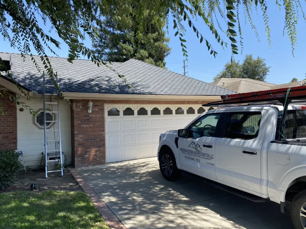 Slide of Modern Roofers and Restoration