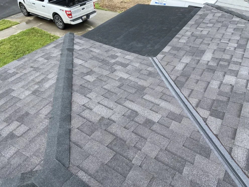 Slide of Modern Roofers and Restoration