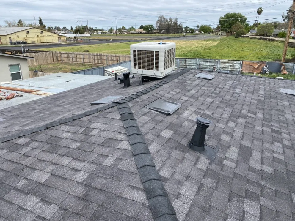 Slide of Modern Roofers and Restoration