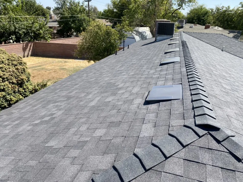 Slide of Modern Roofers and Restoration