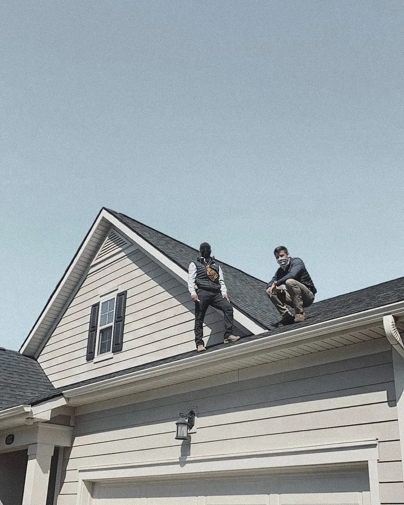 Slide of Modern Roofers