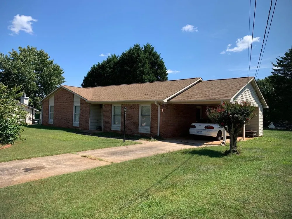 Slide of Modern Roofing