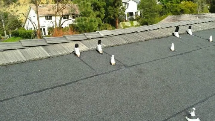 Slide of Modern Roofing Inc