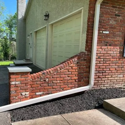 Modest Masonry & Construction Logo