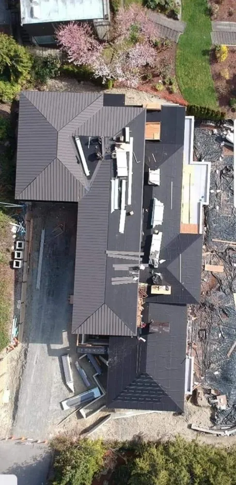 Slide of Moe Roofing