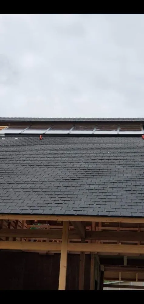 Slide of Moe Roofing