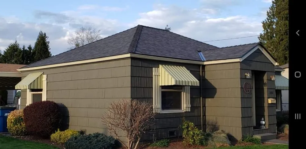 Slide of Moe Roofing