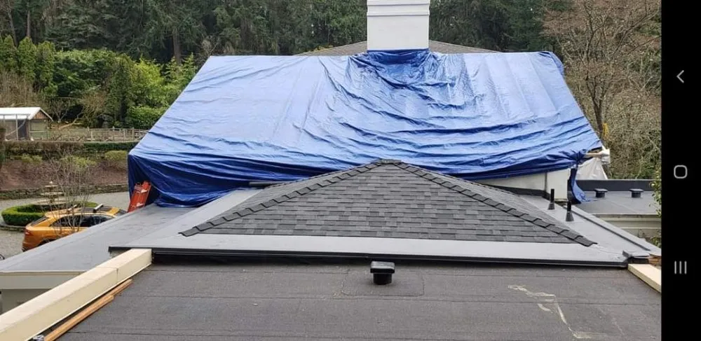 Slide of Moe Roofing