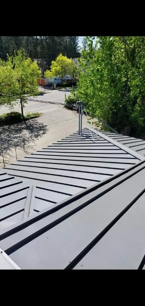 Slide of Moe Roofing