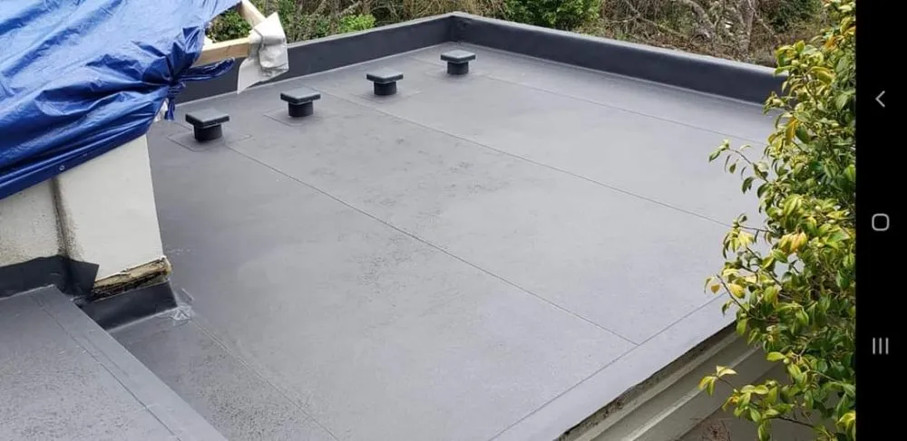 Slide of Moe Roofing