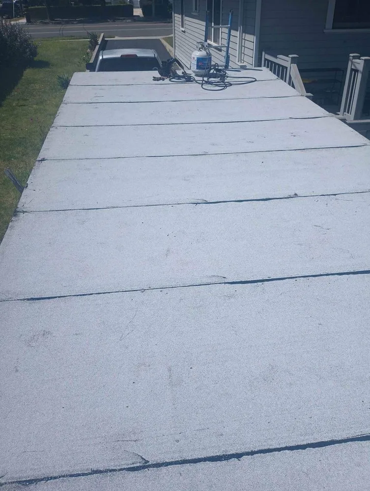 Slide of Molina’s Roofing