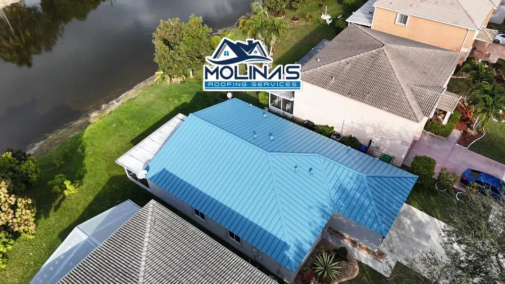 Slide of Molina's Roofing Services
