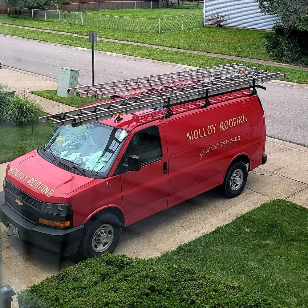 Slide of Molloy Roofing