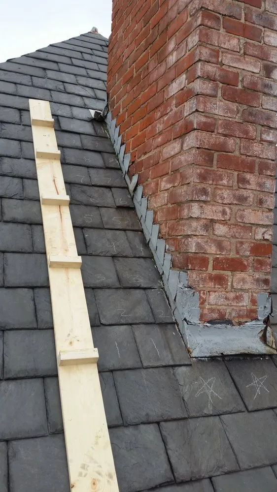 Slide of Molloy Roofing