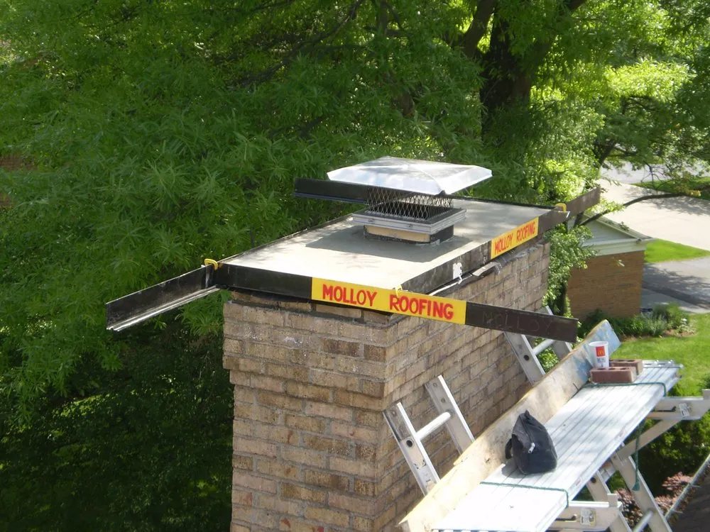 Slide of Molloy Roofing