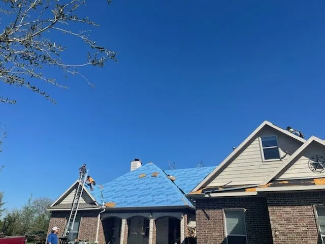 Local roof leak repair same-day service in Grangerland, TX by Momentum Construction Services