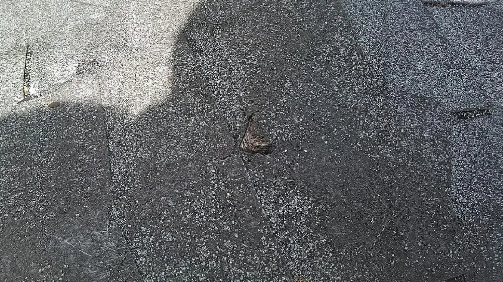 Slide of Monahan Roofing