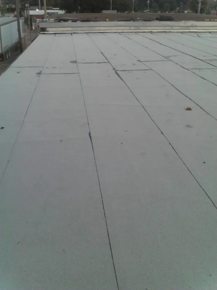 Slide of Monahan Roofing