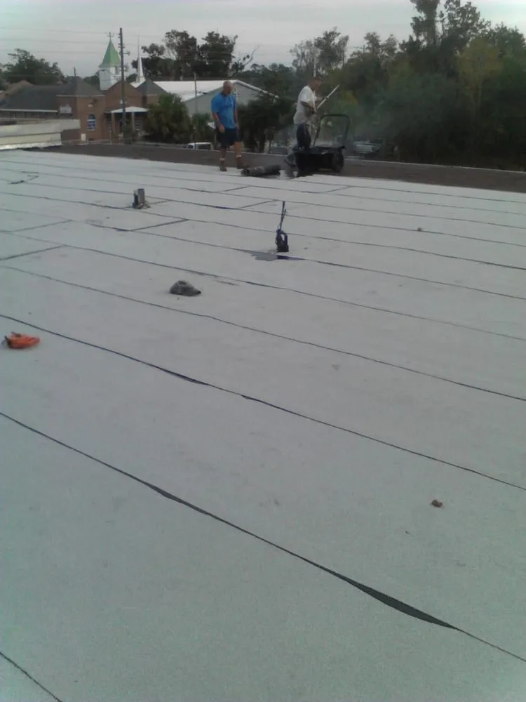 Slide of Monahan Roofing