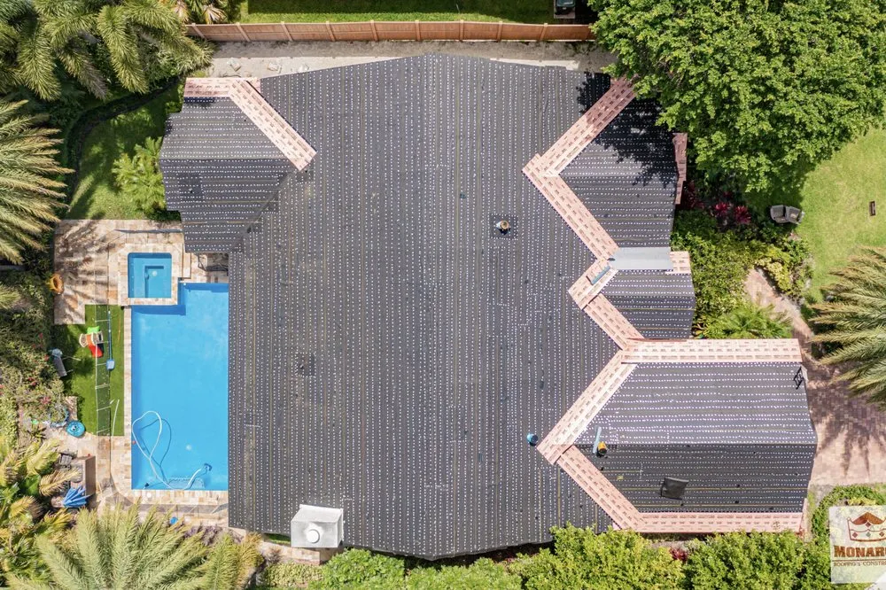 Slide of Monarch Roofing & Construction Inc.