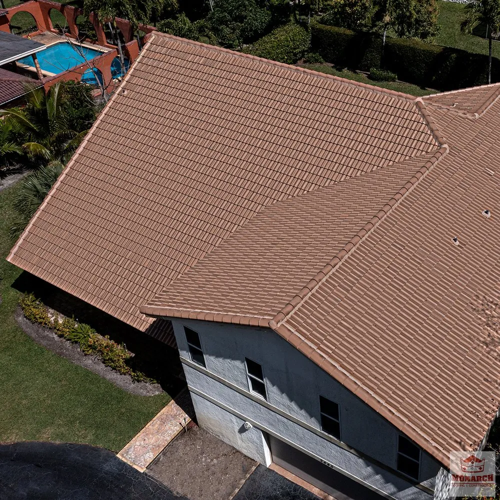 Slide of Monarch Roofing & Construction Inc.