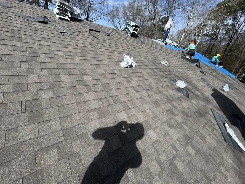 Slide of Monarch Roofing