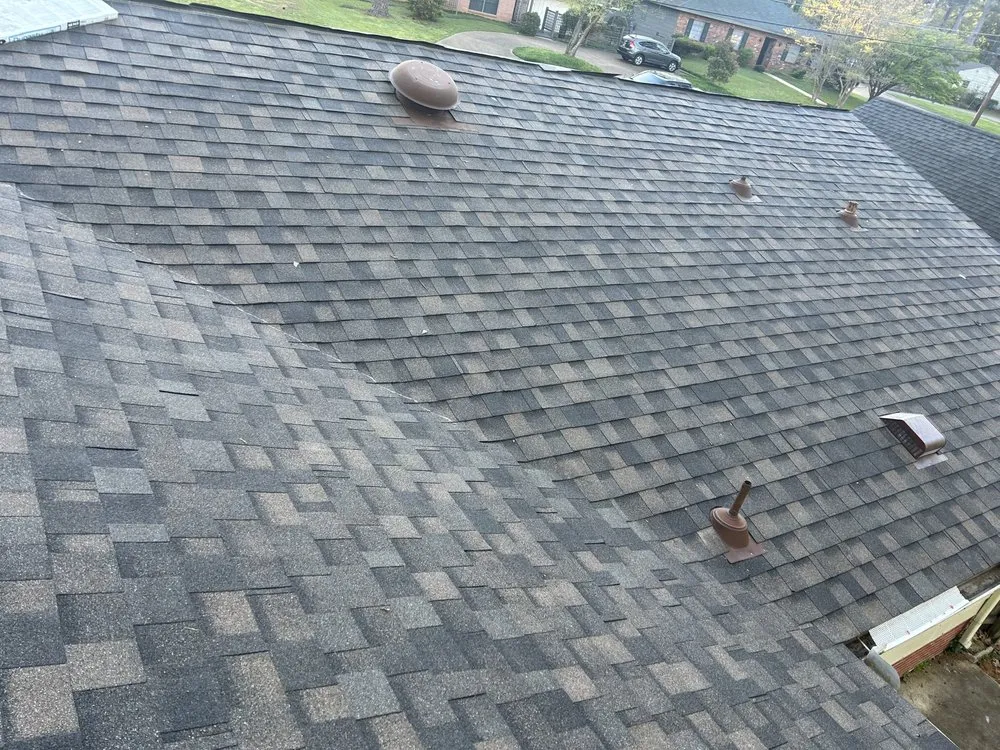 Slide of Monarch Roofing