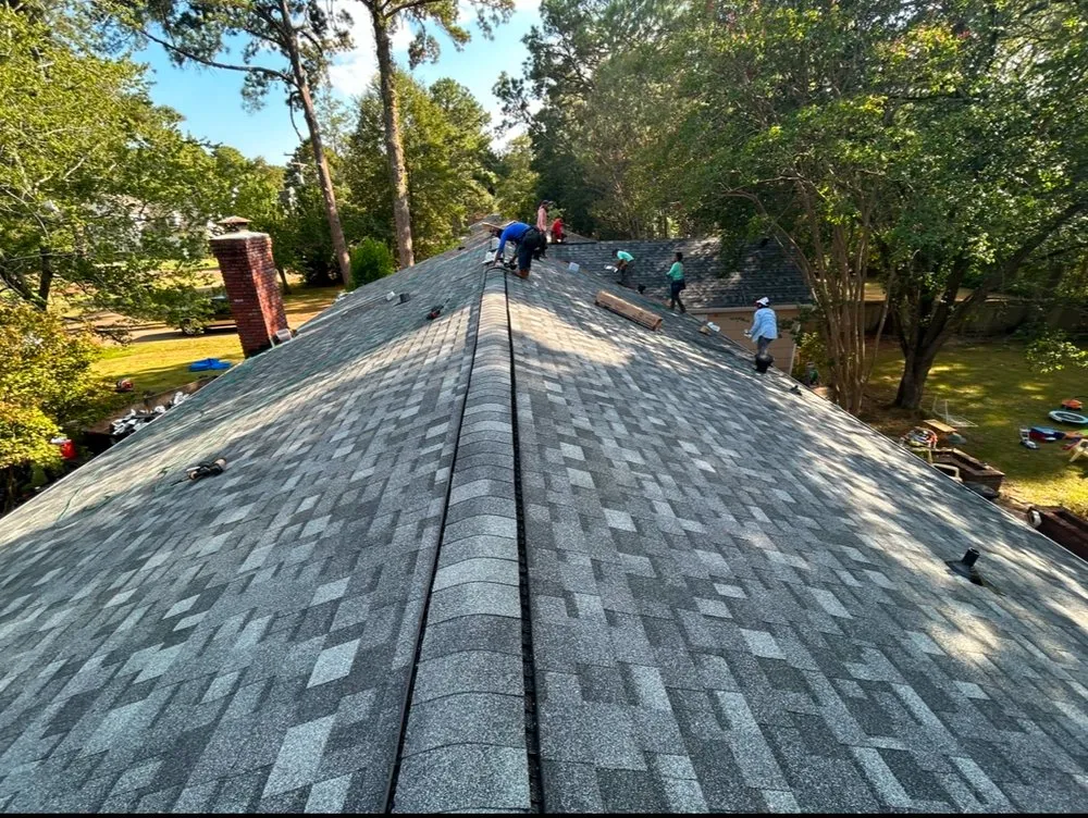 Slide of Monarch Roofing