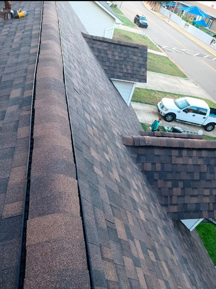 Slide of Monarch Roofing