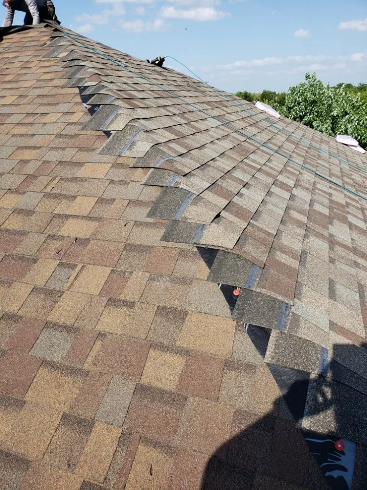 Slide of Monarch Roofing and Construction