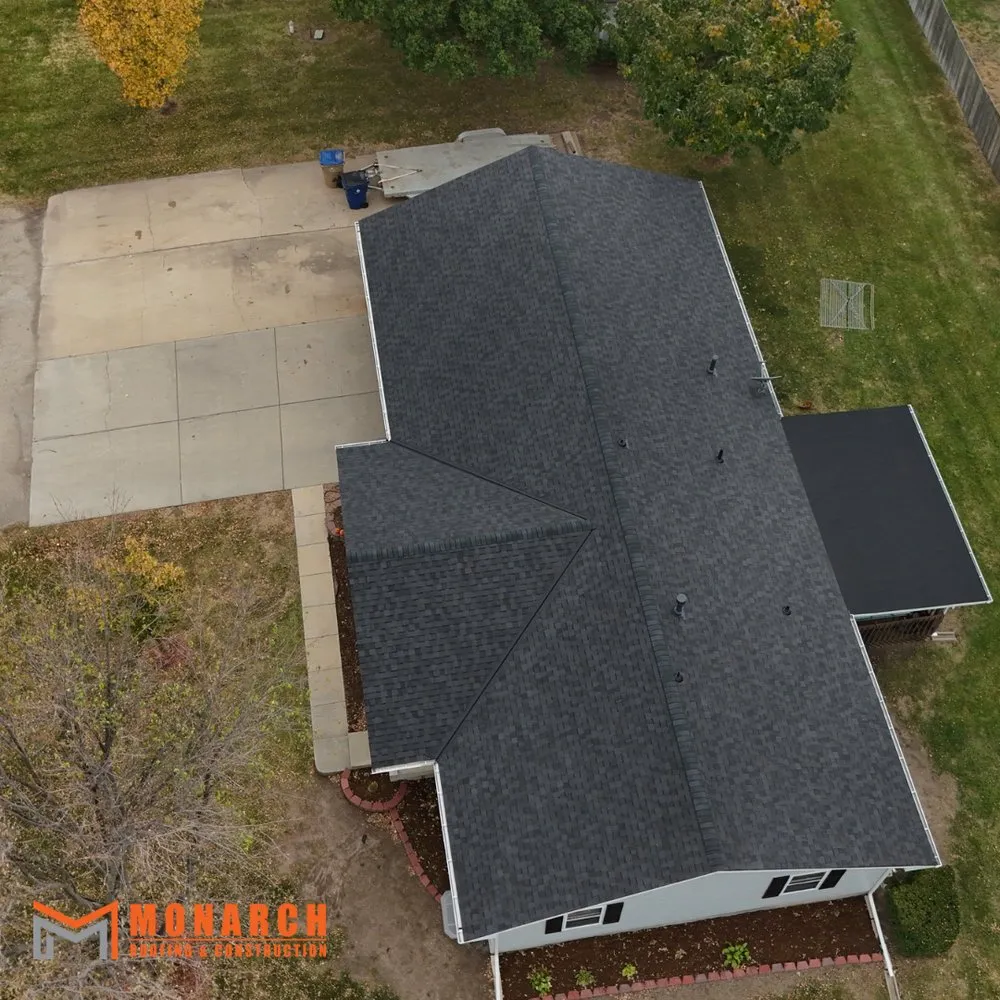 Slide of Monarch Roofing Construction