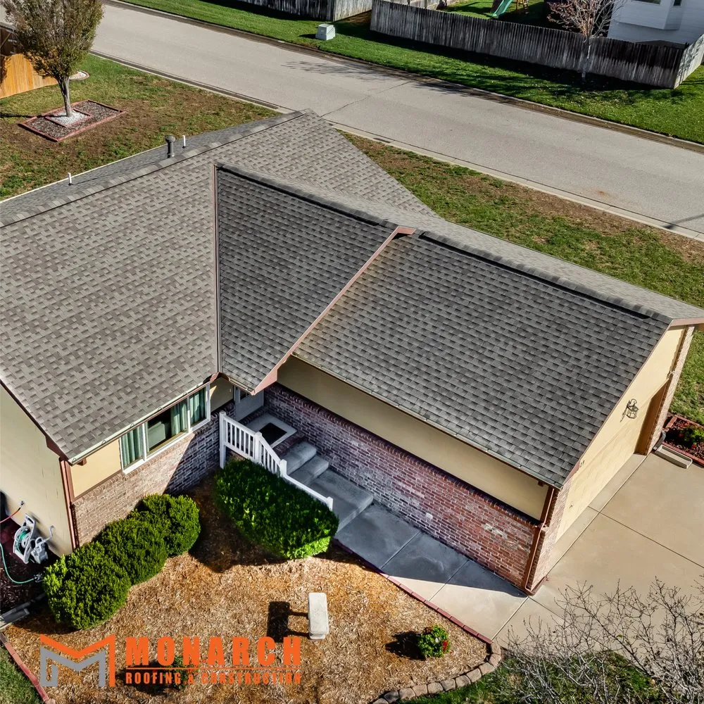 Slide of Monarch Roofing Construction