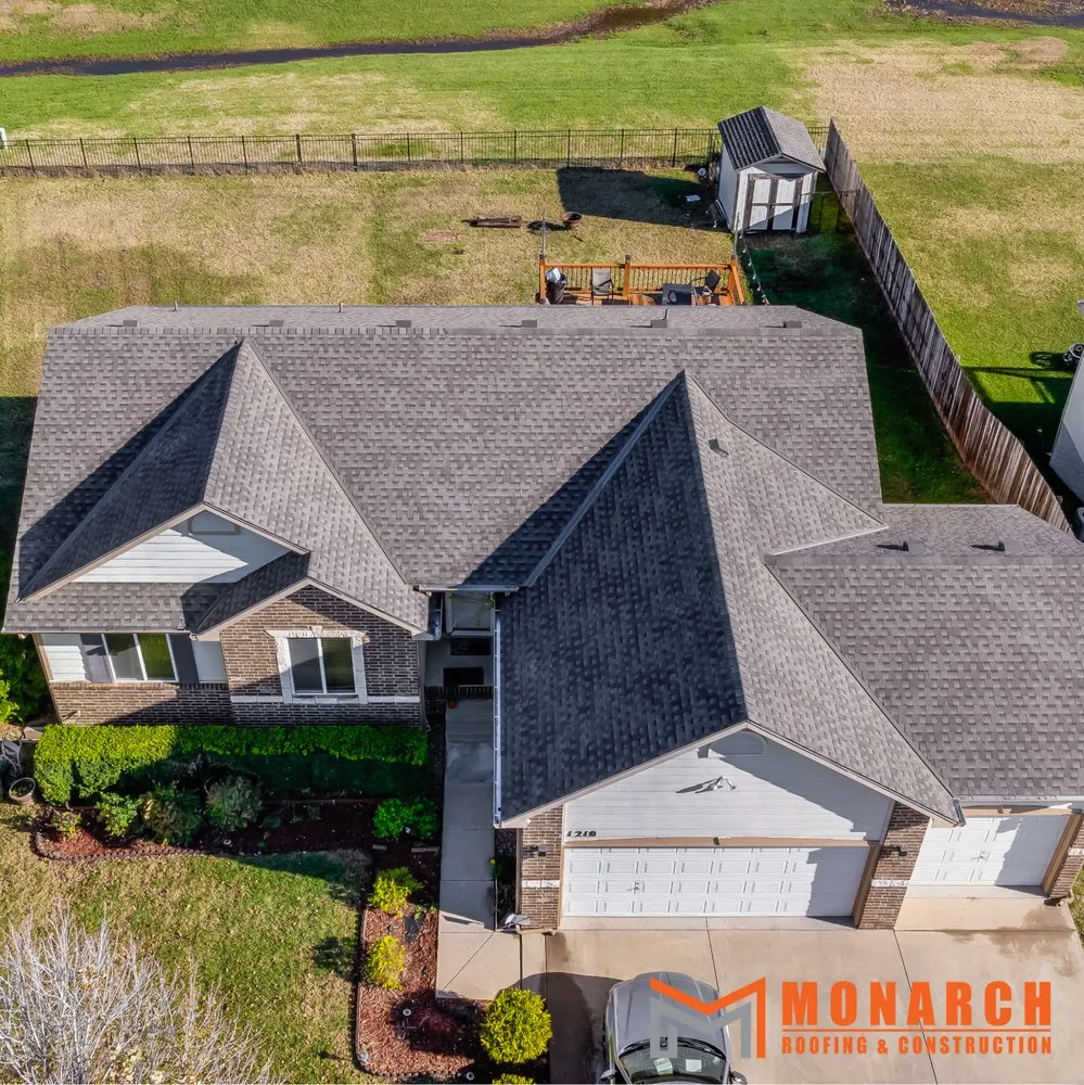 Slide of Monarch Roofing Construction