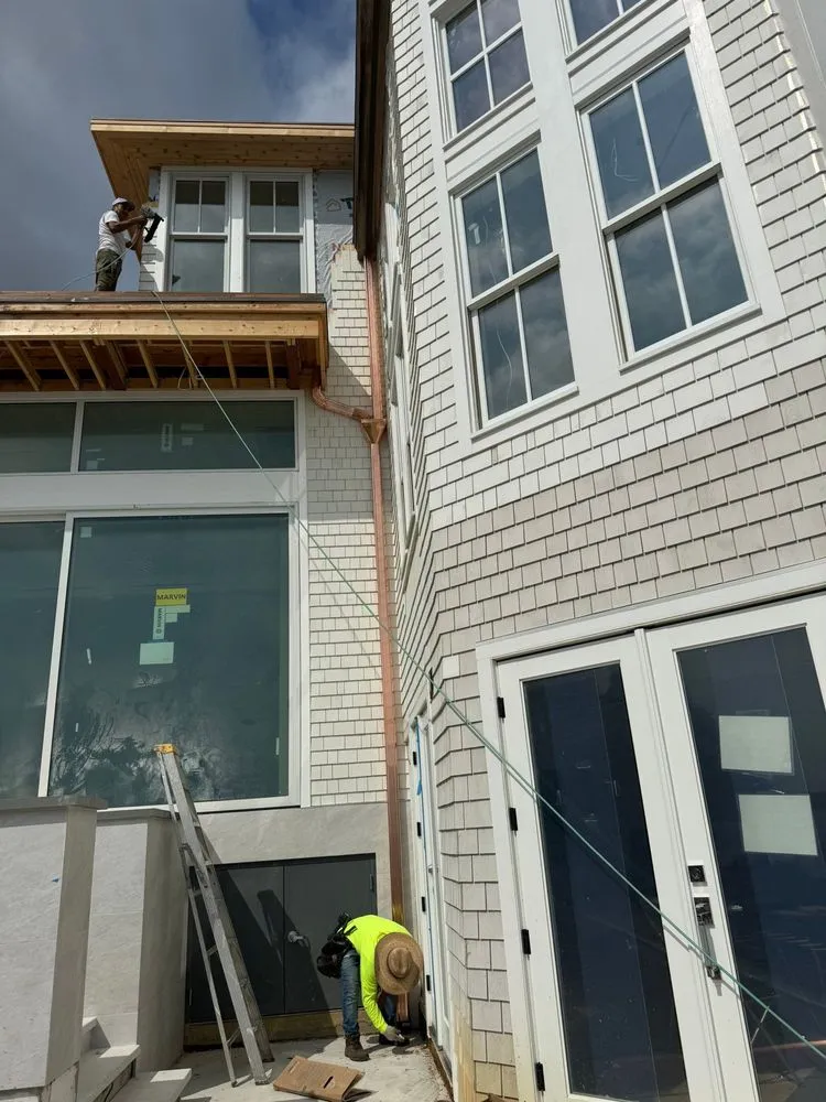 Slide of Monarch Roofing