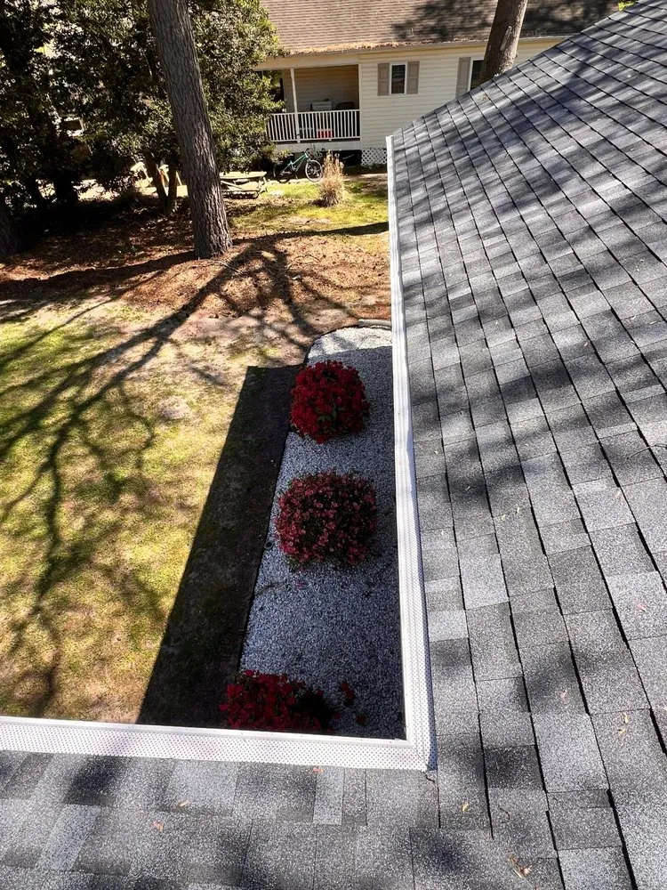 Slide of Monarch Roofing