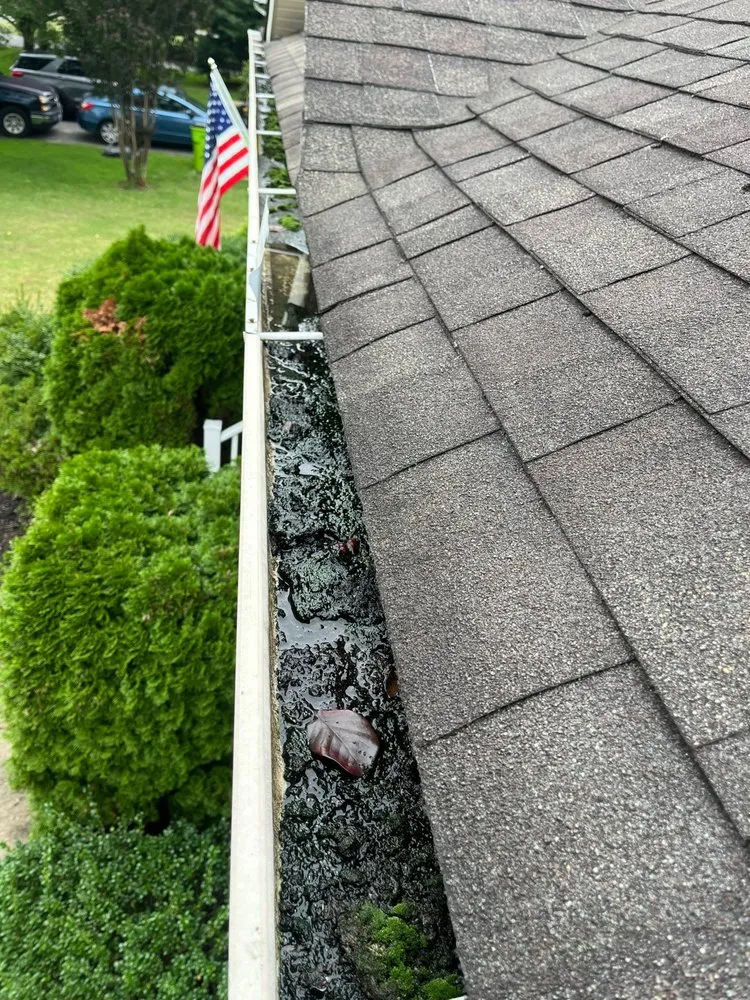 Slide of Monarch Roofing